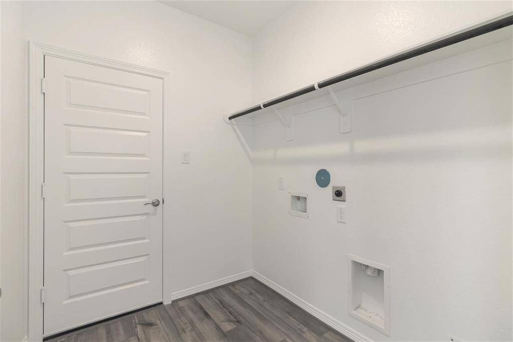 This bright utility room makes even the most mundane chores feel a little more pleasant