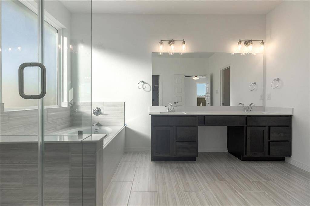 The elegant finishes, from the dazzling floors to the chic light fixtures, reflect a caref