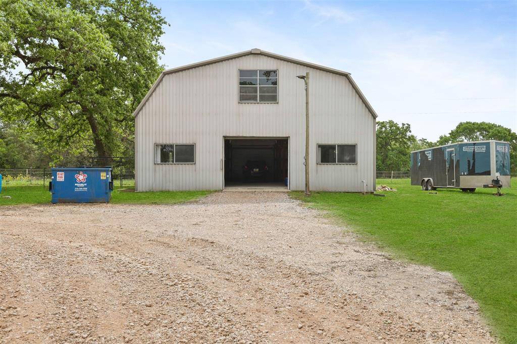 Large workshop with abundant space for tools, toys, and hobbies.