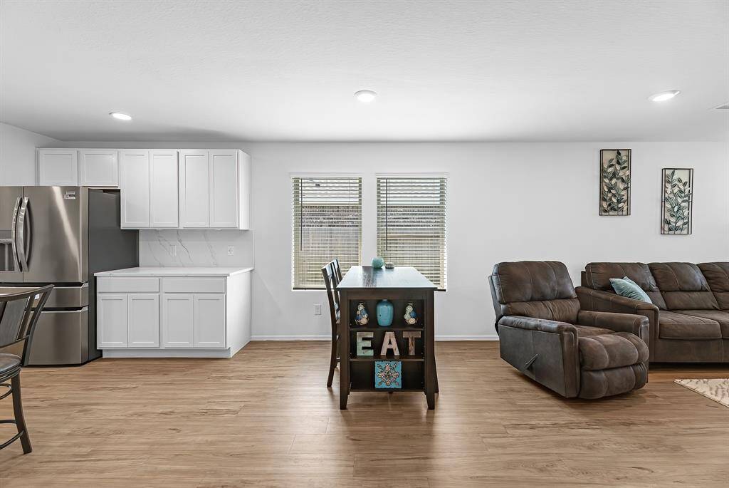 Kitchen open to dining area and living room