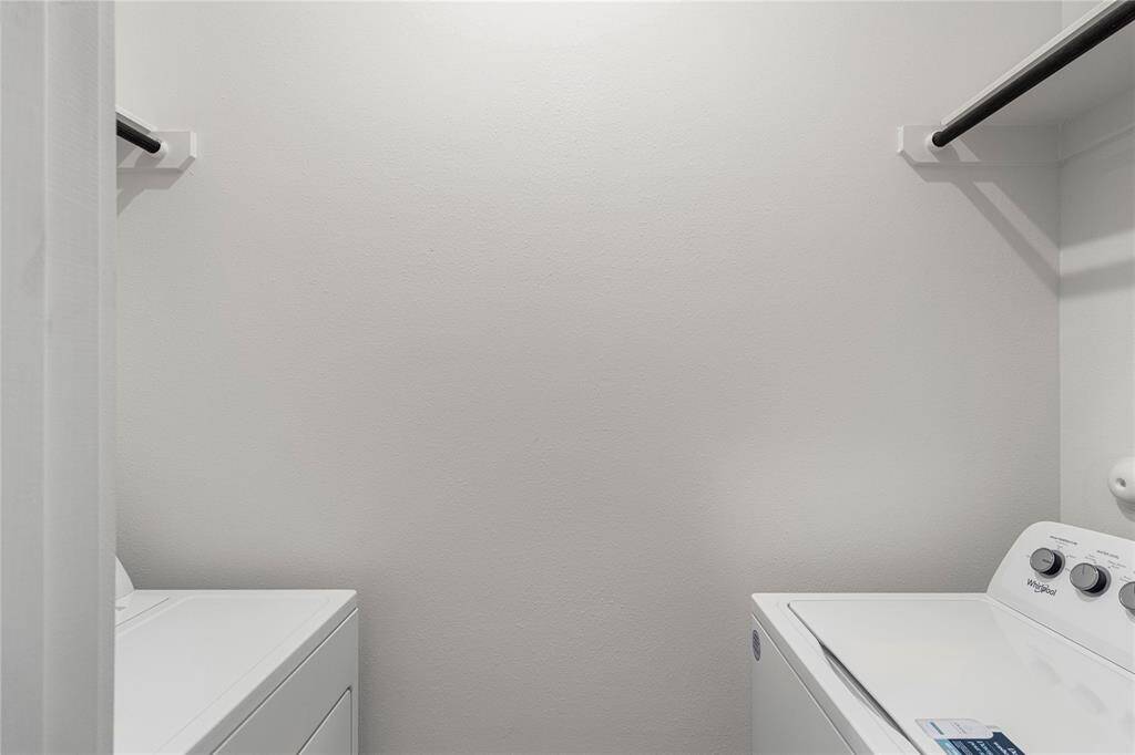 Second floor washer and dryer area.