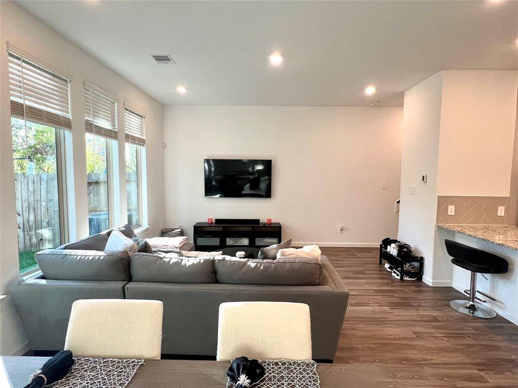 Large windows in the main living area let in plenty of natural light.