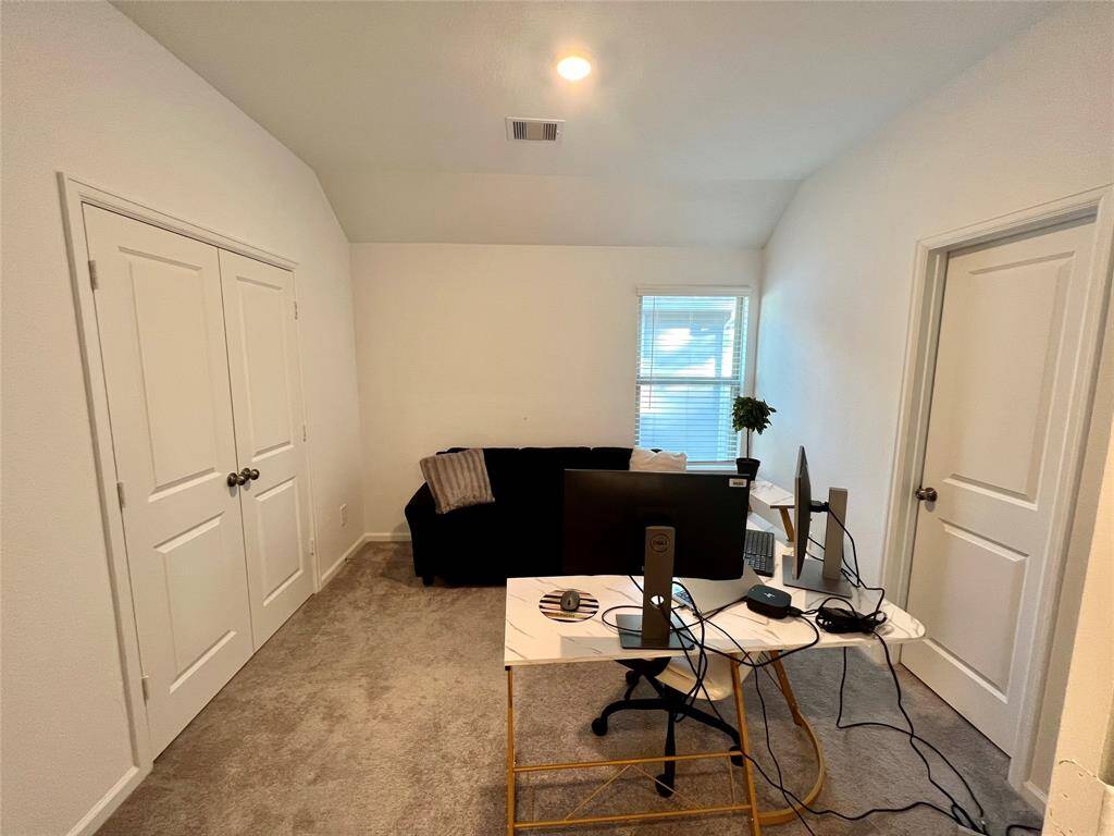 Secondary bathroom with huge walk-in shower & sleek modern finishes.