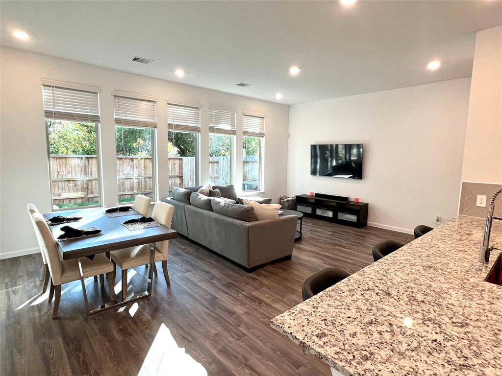 Kitchen is open to the dining & living area, perfect for families and entertaining.