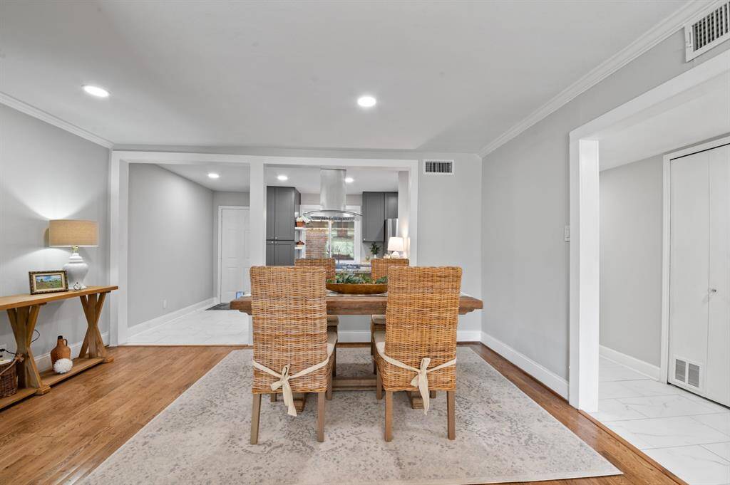 Dining room has ample space for a dining room table and bonus hutch or console.