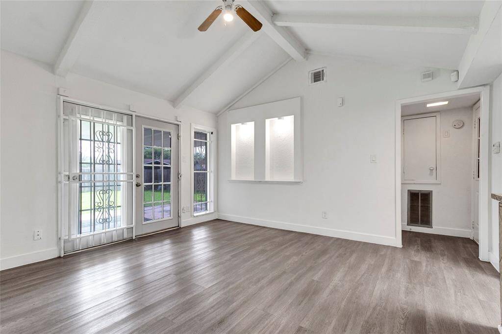 Formal living room that flows into the kitchen