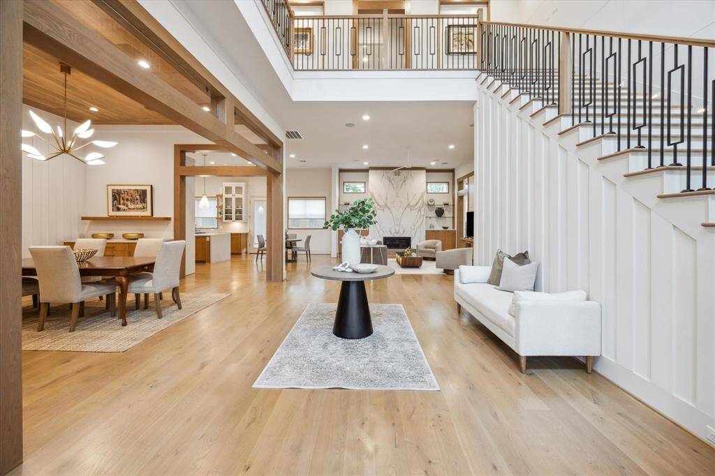 Welcome to 739 Azaleadell. This custom built, entertainers dream. Upon entering this entertainer's dream home, guests are greeted in this grand two-story foyer. 7" French oak wood flooring flow throughout the foyer, living, family, dining, and kitchen.