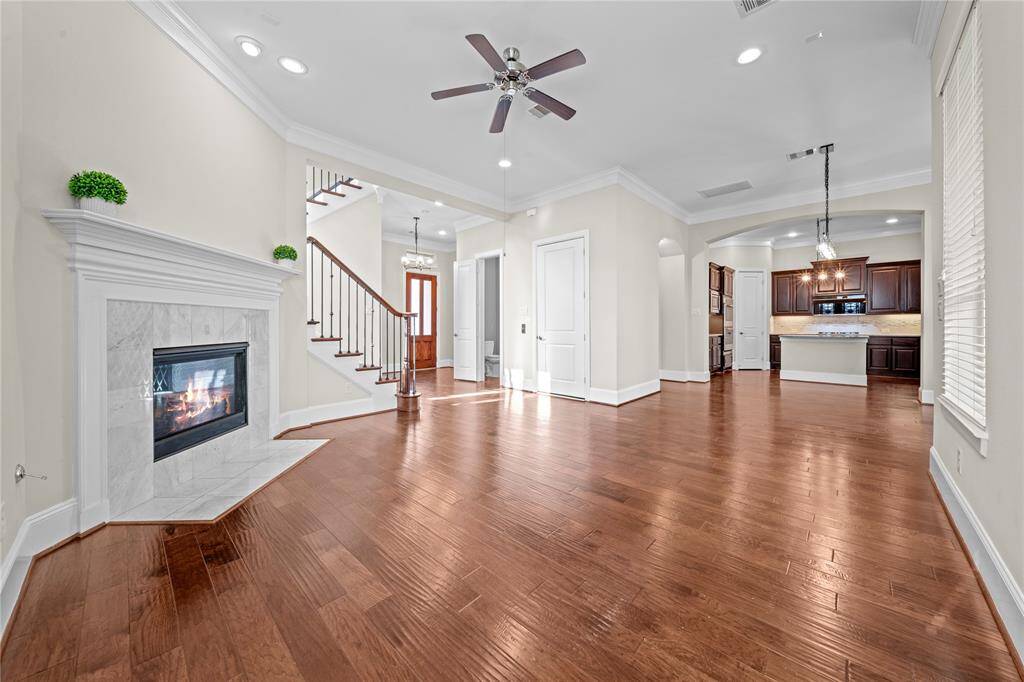 Comfortable living area with soaring ceilings and ample natural light.
