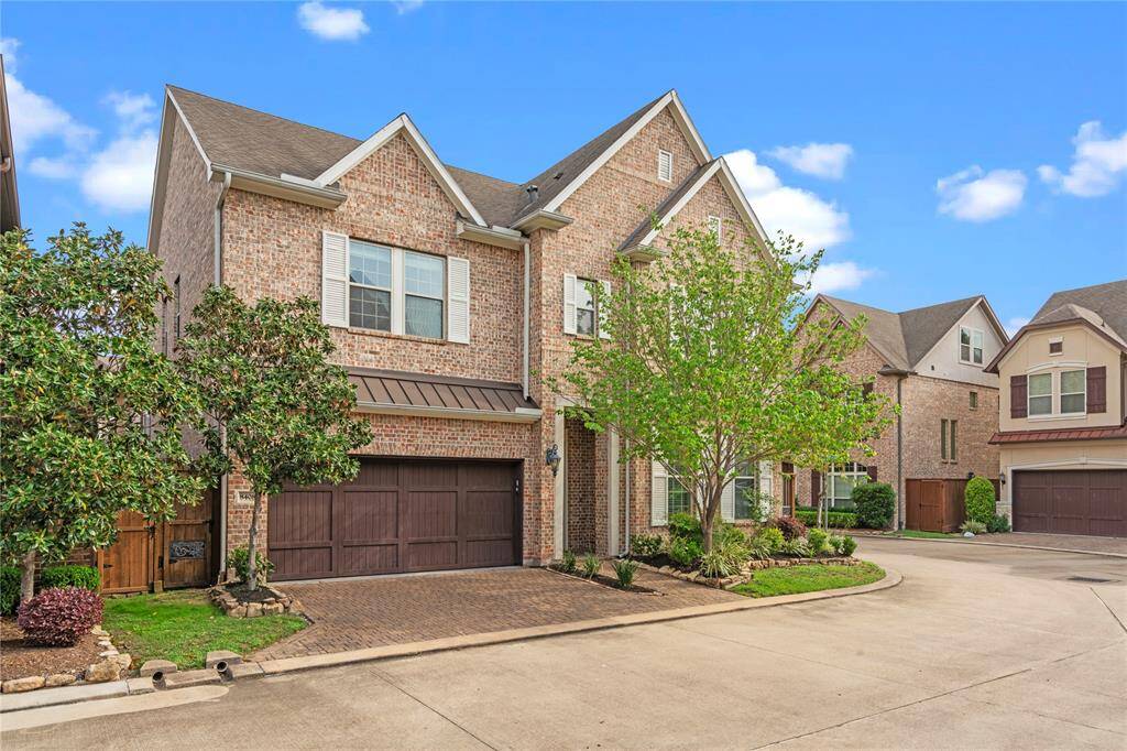 Gorgeous brick exterior showcasing elegant architecture in a desirable neighborhood.