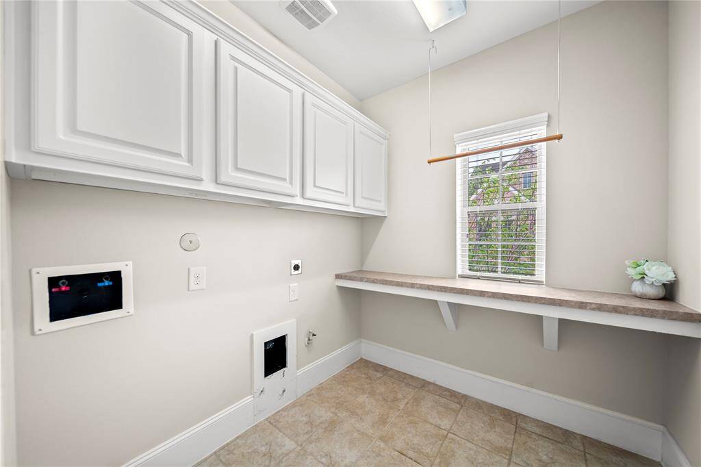Versatile space perfect for a nursery, office, or private lounge.
