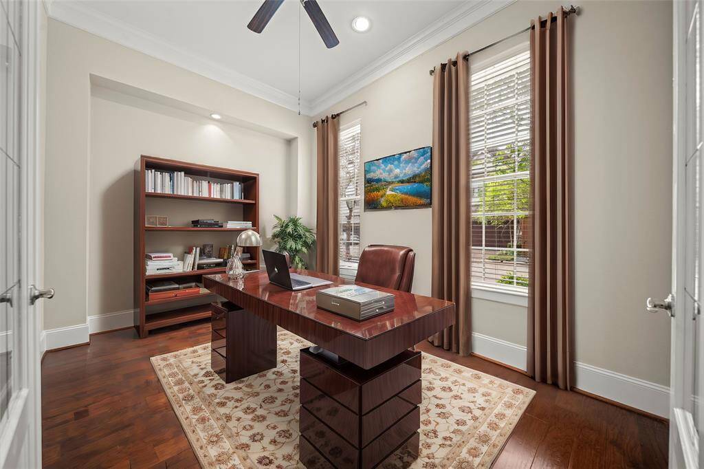 Spacious room ideal for an office or guest bedroom, filled with sunlight.(Virtual Staged)