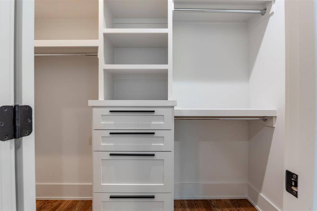 Laundry opposite for washer/ dryer and more cabinets.