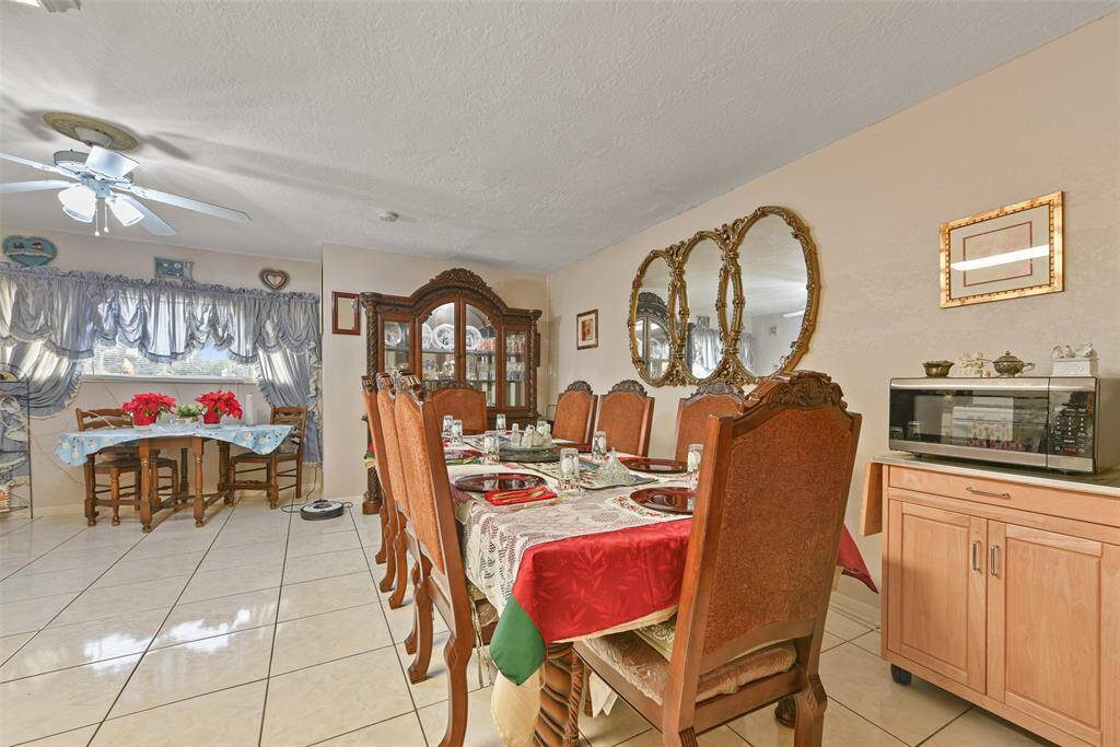 This large kitchen allows for any arrangement of furniture, dining or appliance needs.