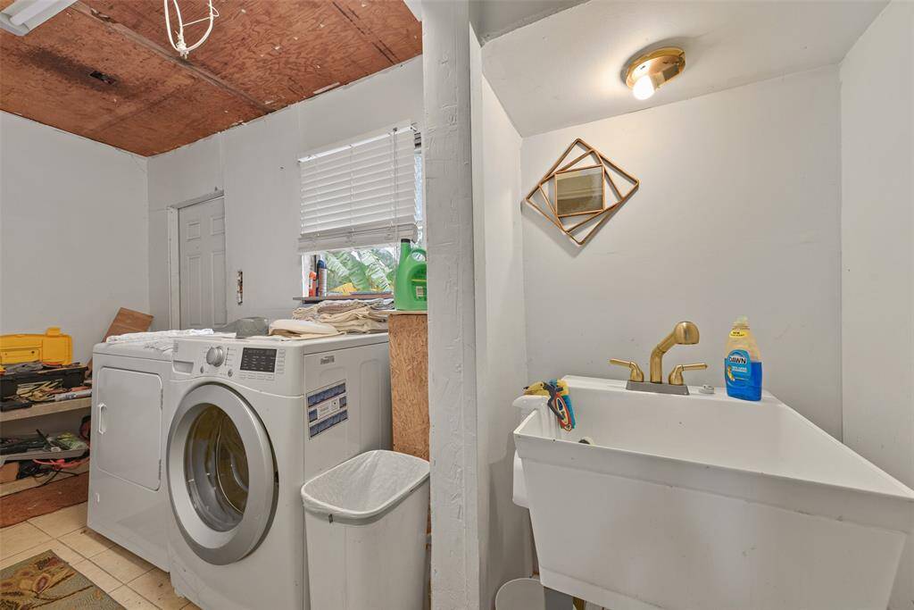 The laundry room offers a utility sink- perfect for the dirtiest clean-ups.