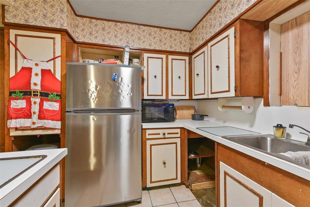 Enjoy double-sinks and designated cutting-board countertop spaces for ease while cooking.