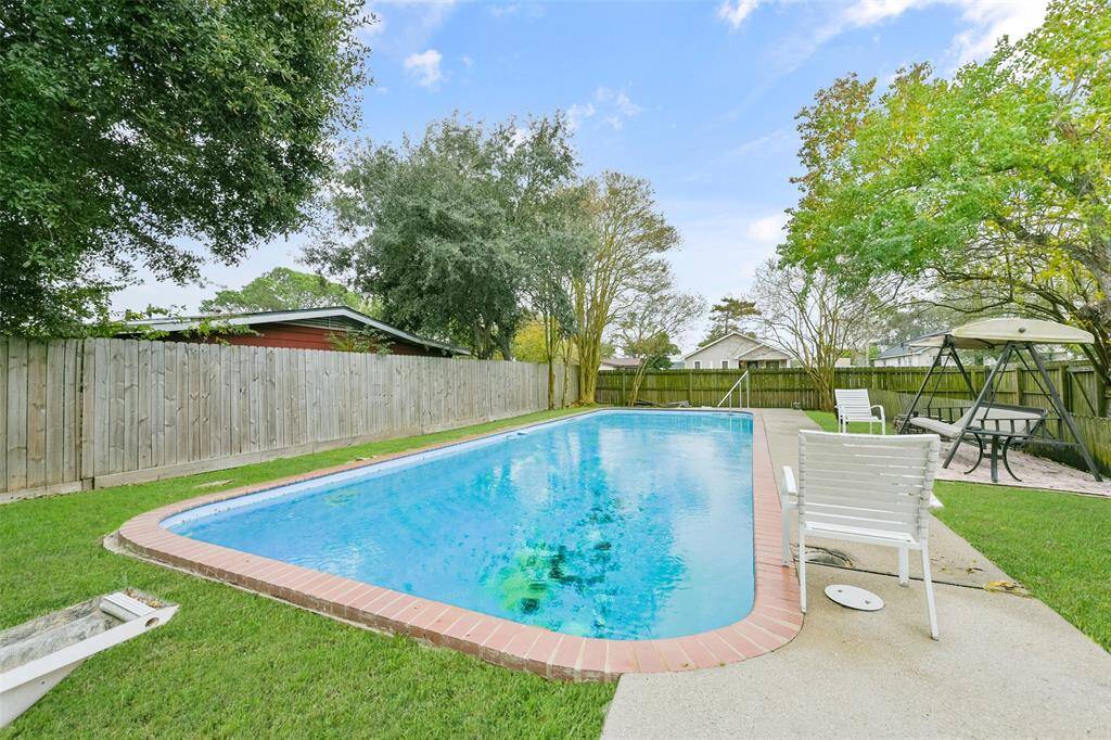 This pool area is fenced-in for safety and privacy.
