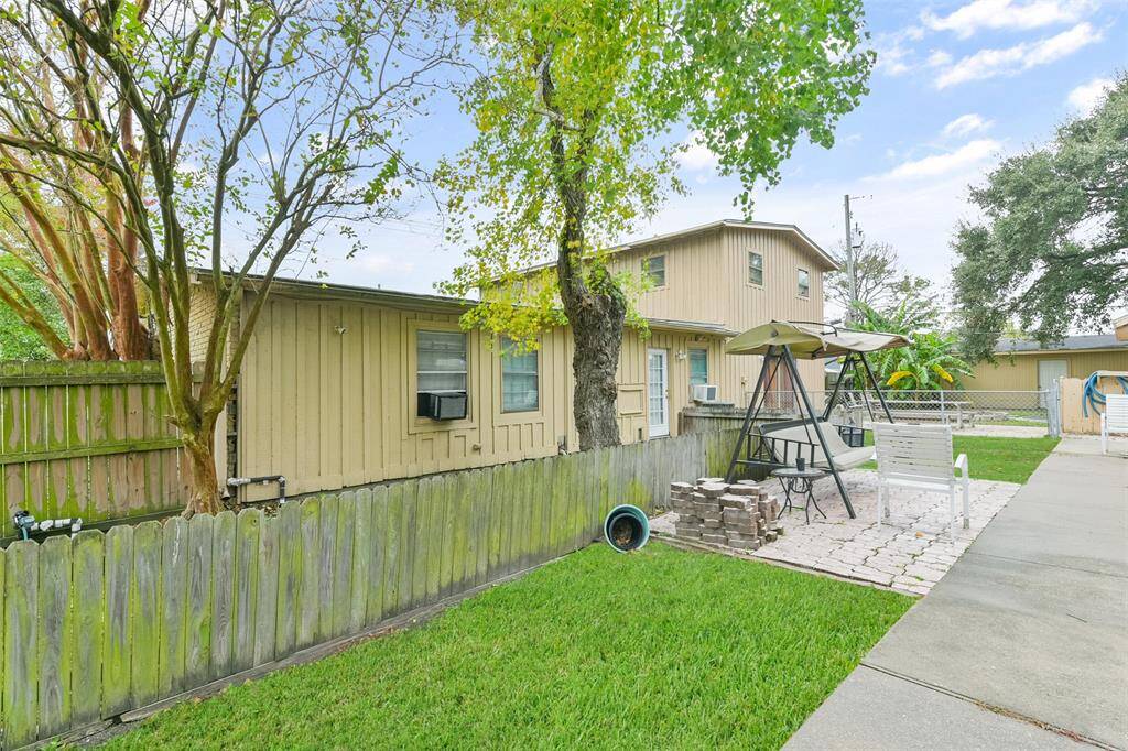 Separate fenced in area for the other duplex tenant for privacy.