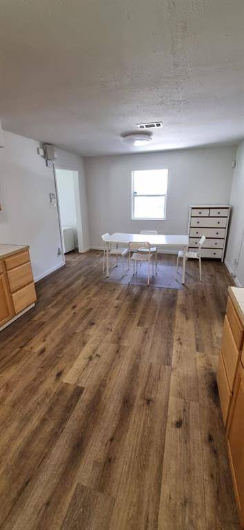 The spacious kitchen offers plenty of storage and is perfect for gathering with family and friends