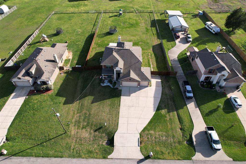 Property in red outline. Minutes away from Lake Conroe