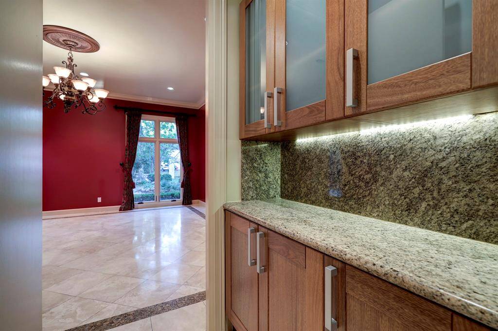 The Butler's pantry grants access between the dining room and kitchen ideal for dinner parties!