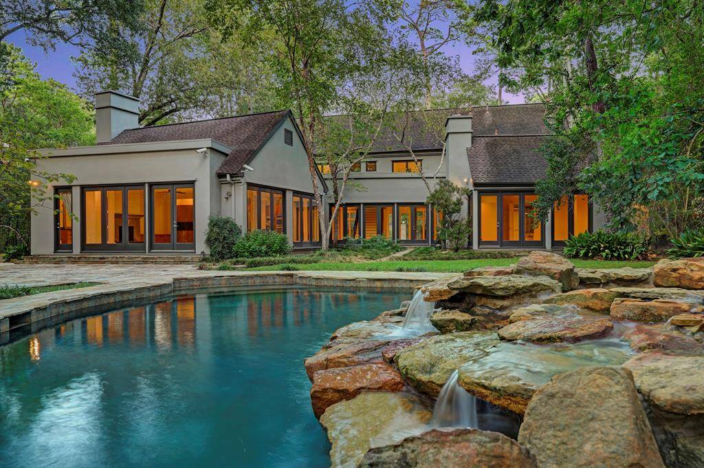 The property is situated on a an acre lot with a great pool and plenty of backyard space.