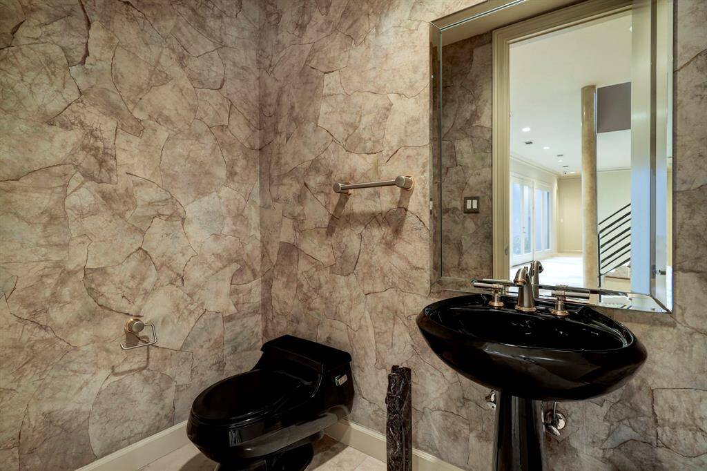 The main powder bathroom situated off the living room.