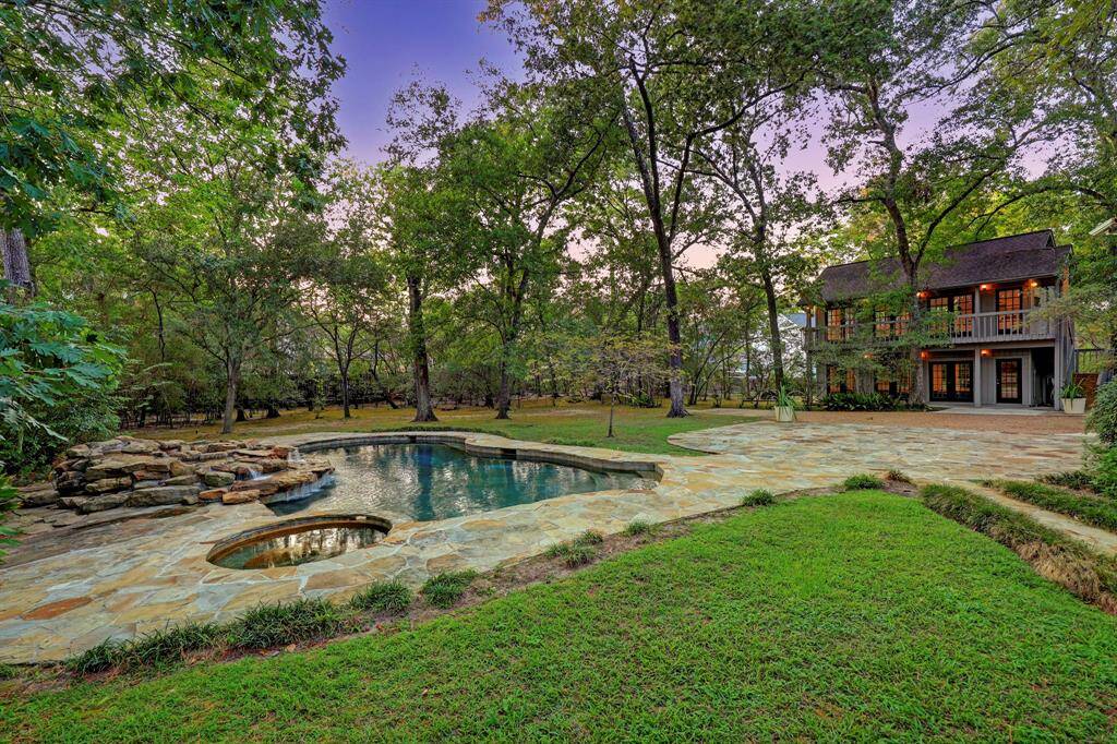 The expansive backyard and guest house is a rare find!