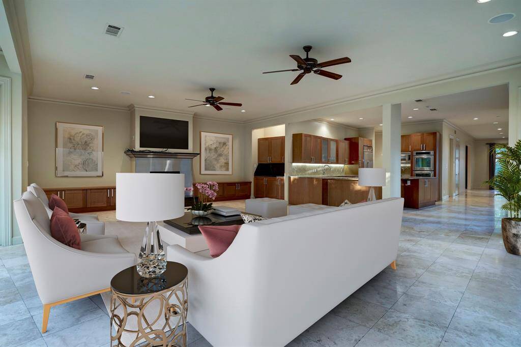 Staged photo of the family room showing its serving counter from the kitchen.