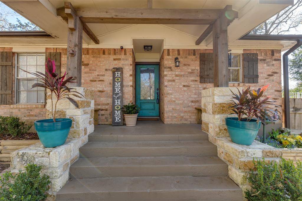Gorgeous front porch with built in seating on both sides. (not pictured).