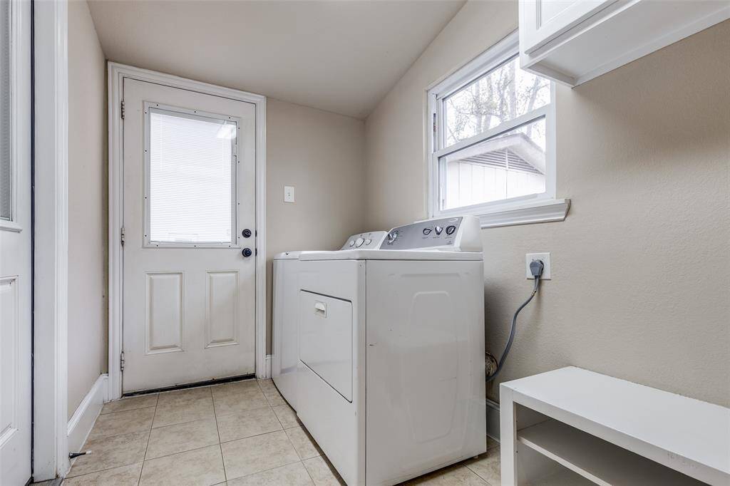 Laundry room located inside the home with exterior door leading to the garage and shop, or back yard to get into the pool. BUYER BONUS...Washer and dryer stay with the home.