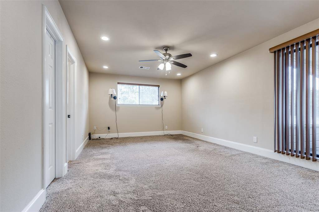 Another view of the primary bedroom from the entry.
