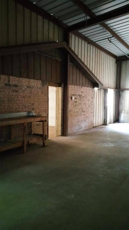 Shop Interior showing access to the garage from the shop.