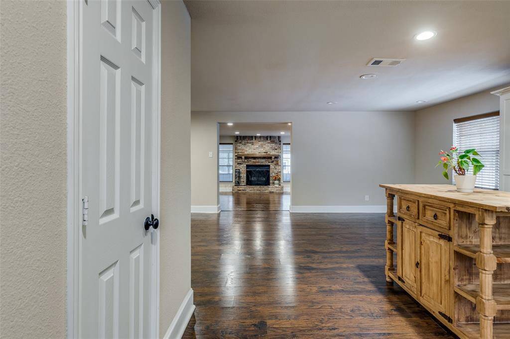 View as you enter the home from the front door. BUYER BONUS- Kitchen Island pictured on the left stays with the home.