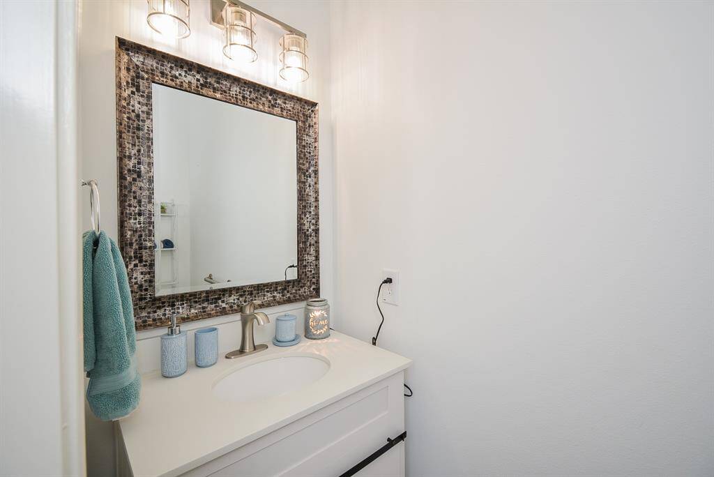 Even this trim half-bath has tranquil personality.