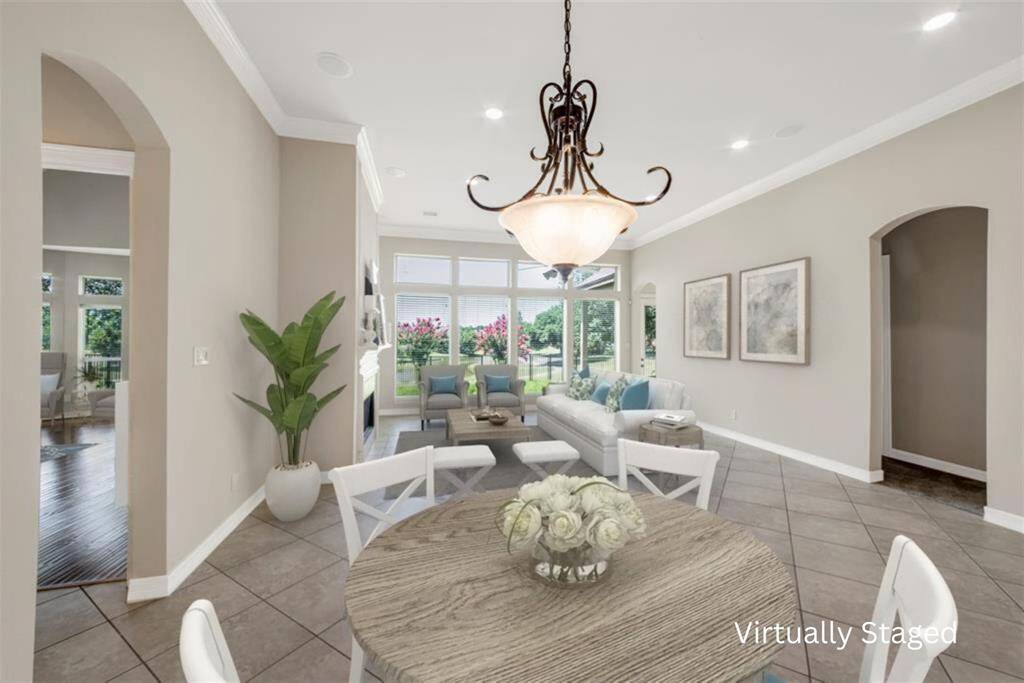 The breakfast area, right off the kitchen, is spacious and perfect for family meals or weekend pancake breakfasts. Open to the family room, it's the ideal spot for gathering and enjoying quality time with loved ones.
