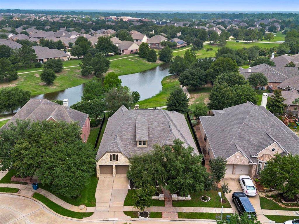 From above, the home presents a picturesque sight, with its new 2024 roof.   Installed in January, no expense was spared with installation of 30 year Timberline shingles, ridge vents, GAF Storm Guard in all valleys and the addition of solar powered attic vents ensuring a top quality roof that will last for years to come.