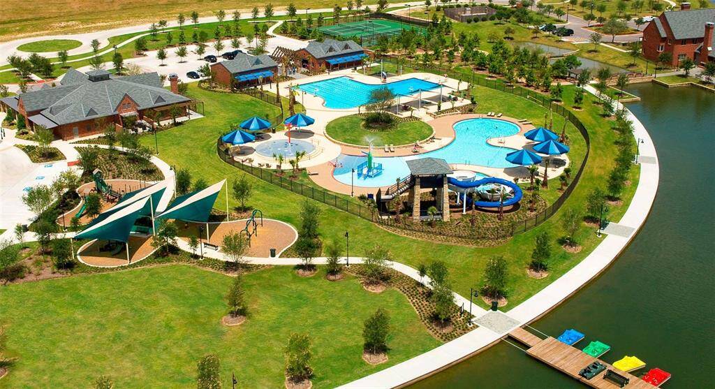 Swim, work out, and play tennis at the 6,000-square-foot activity center. Explore nature trails for hiking and biking, or take to the waterways with kayaking, paddle boating, and canoeing. Enjoy birdwatching from Treehouse Park and the Birding Tower at Josey Lake. As a Bridgeland resident, you'll have exclusive access to these unique amenities and many more, making it the perfect place to call home in northwest Houston.  Photo courtesy Newmark Homes