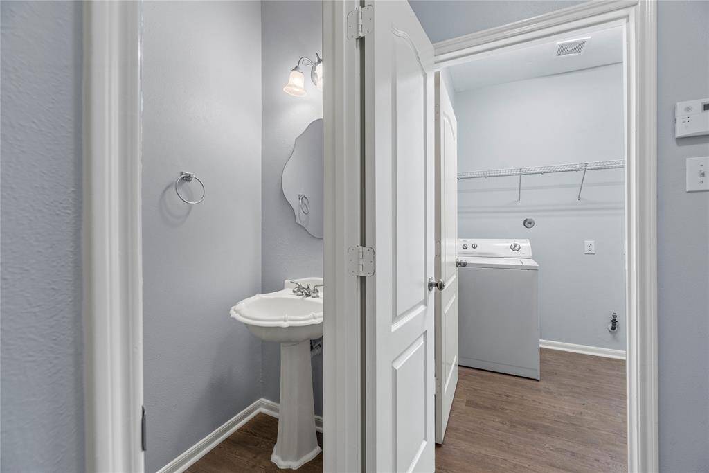 Half bathroom next to the utility room