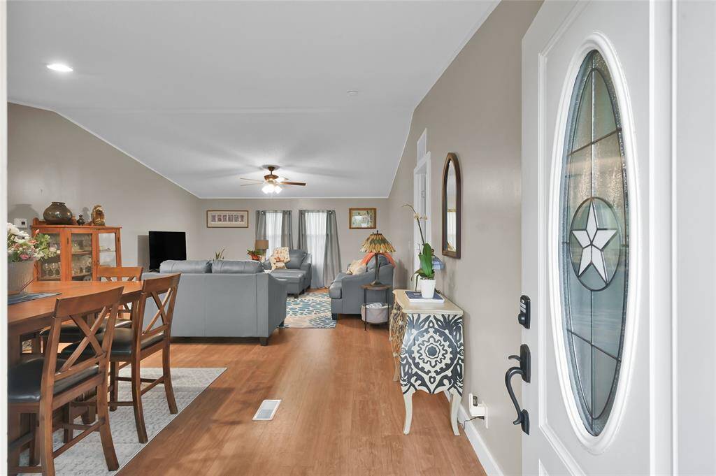 Welcoming entrance leading to living area.