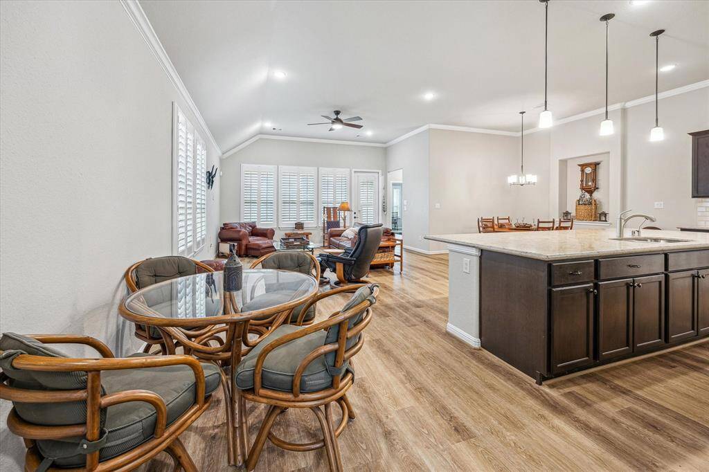As you walk in from the front entry there is plenty of space for a Game Table and lots of hall space open to the Kitchen area.