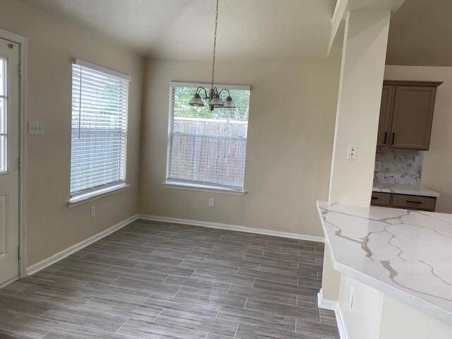 Bright breakfast nook with elegant flooring. Ideal for savoring your morning coffee