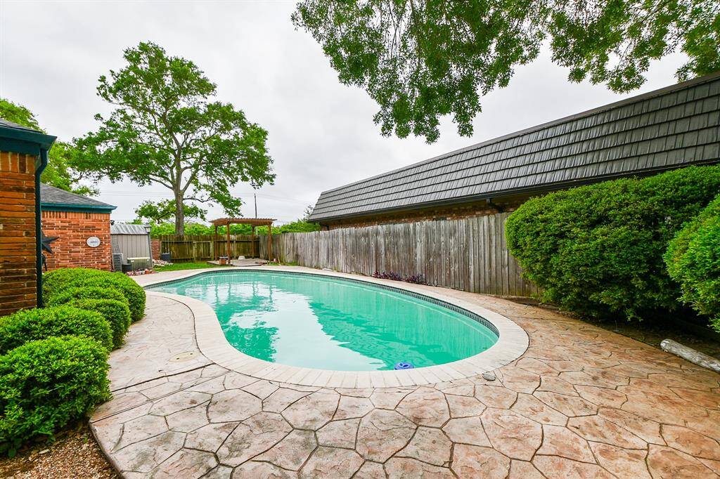 Even the house next door can't see into your side yard and pool area