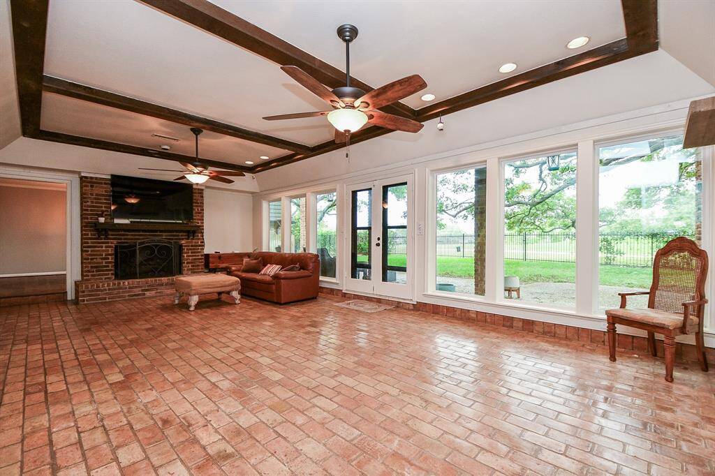 Large windows extend the length of the room showing the golf course and water views we will see shortly