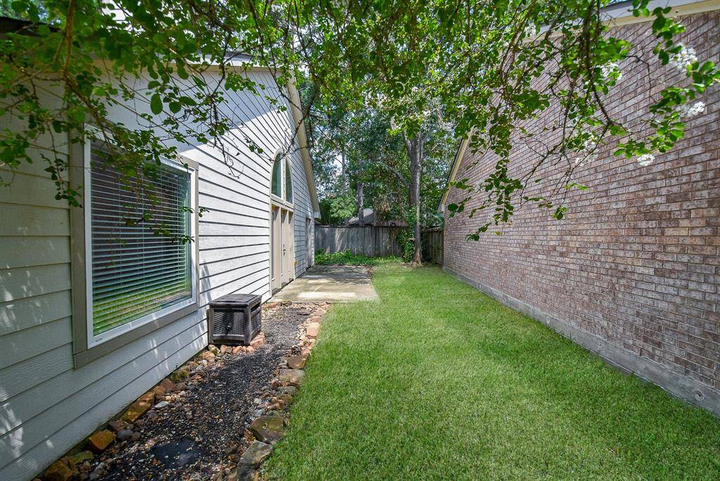 another view of the back of the house shows the privacy, but there is plenty of space to enjoy your outdoor space.