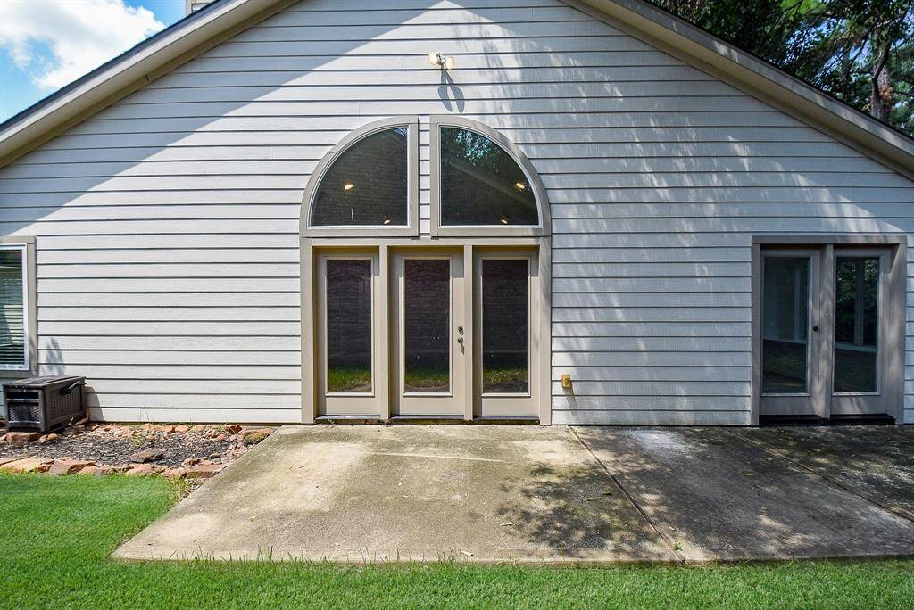 Off of the Living Room & Kitchen, there is a huge patio area that you could create an outdoor kitchen/lounging area if you want to - access to both rooms via French Doors too.