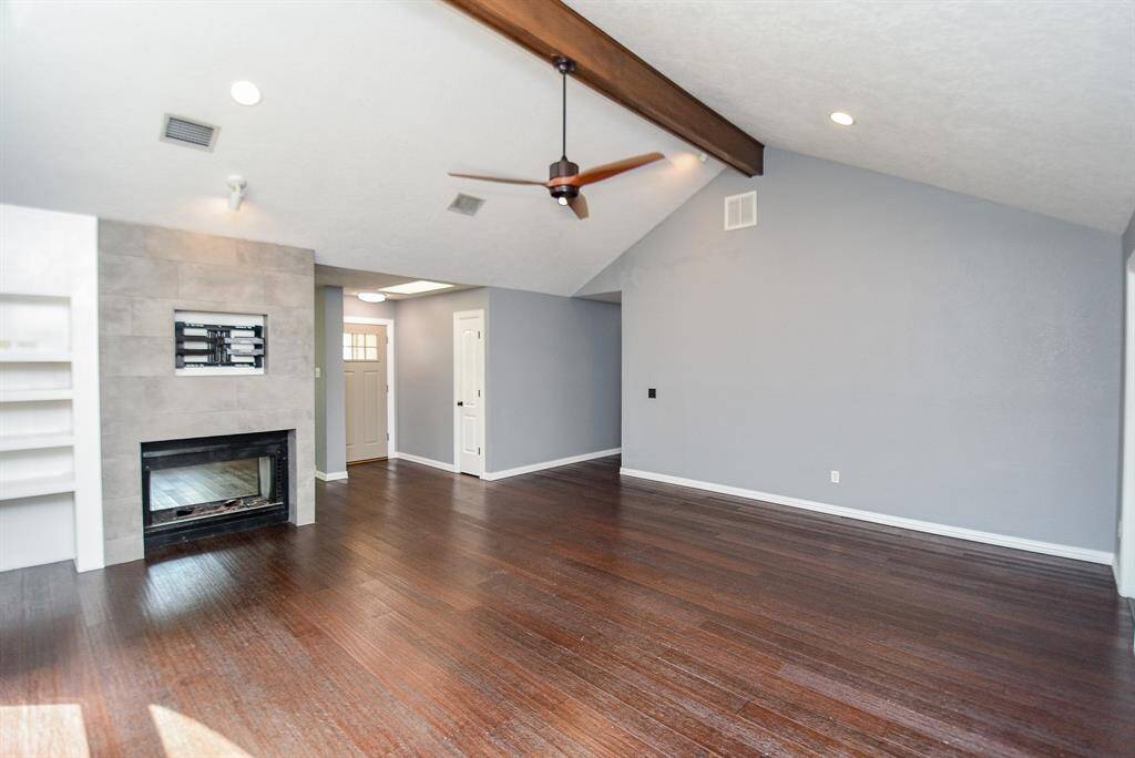 The Living Room is HUGE and has high ceilings which makes it feel even more spacious.