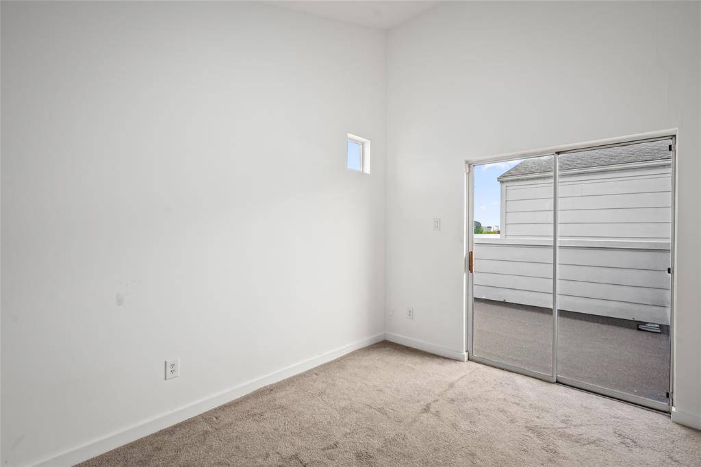 Spacious garage offering secure parking and additional storage, providing both convenience and functionality.