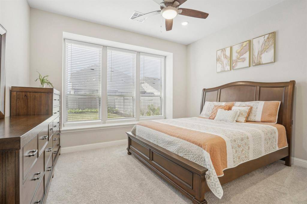 Enjoy southern exposure from the sun and high ceilings in the downstairs primary.