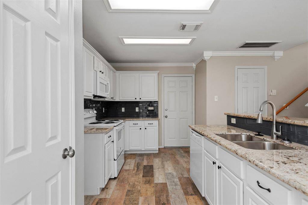 Galley style kitchen with