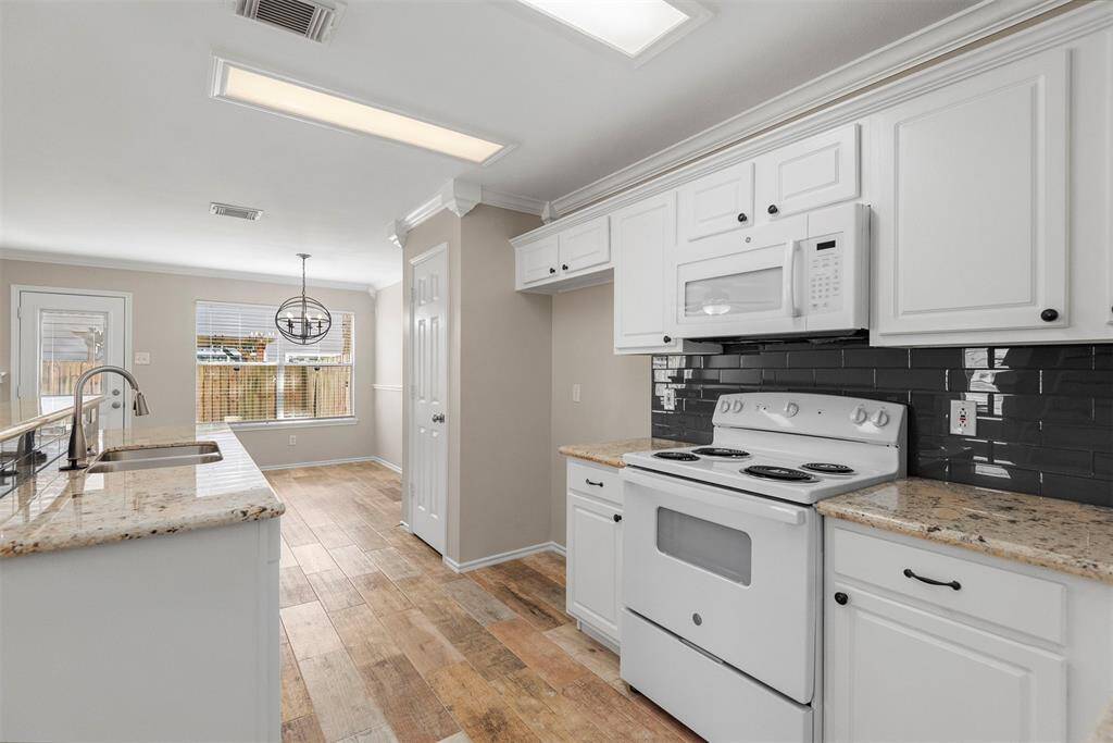 This room is so well lit by natural light from all of the windows!
